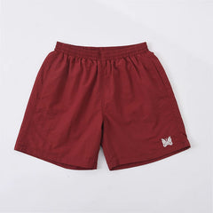 NEEDLES WHITE BUTTERFLY EMBROIDERY BURGUNDY NYLON SHORTS