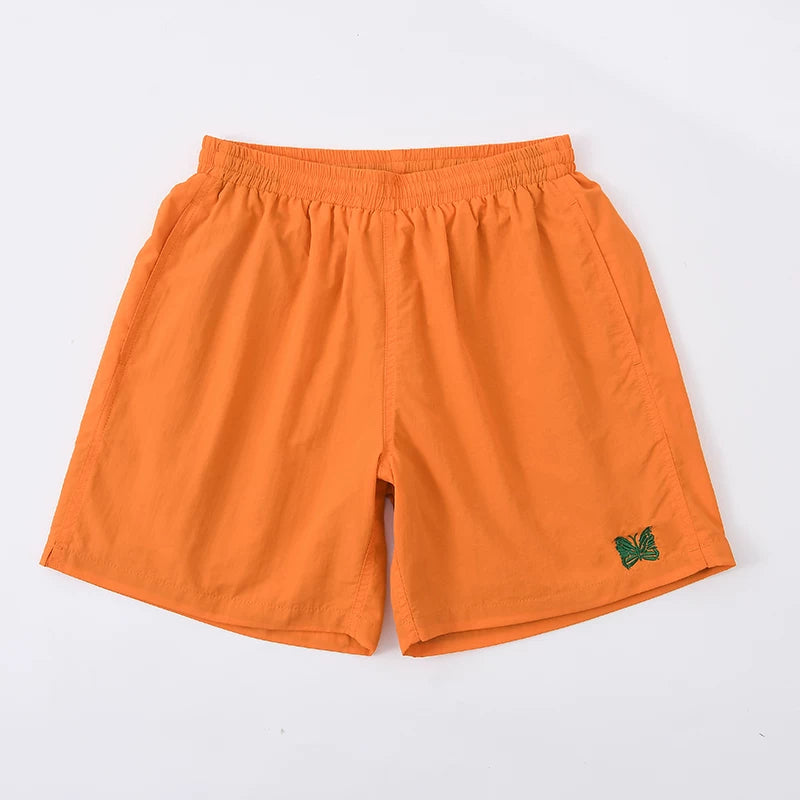 NEEDLES GREEN BUTTERFLY EMBROIDERY ORANGE NYLON SHORTS