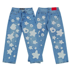 Sp5der white star 6 print light wash baggy denim jeans