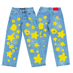 Sp5der yellow star 6 print light wash baggy denim jeans